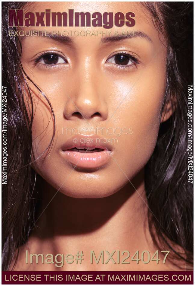 Closeup of a beautiful young woman face
