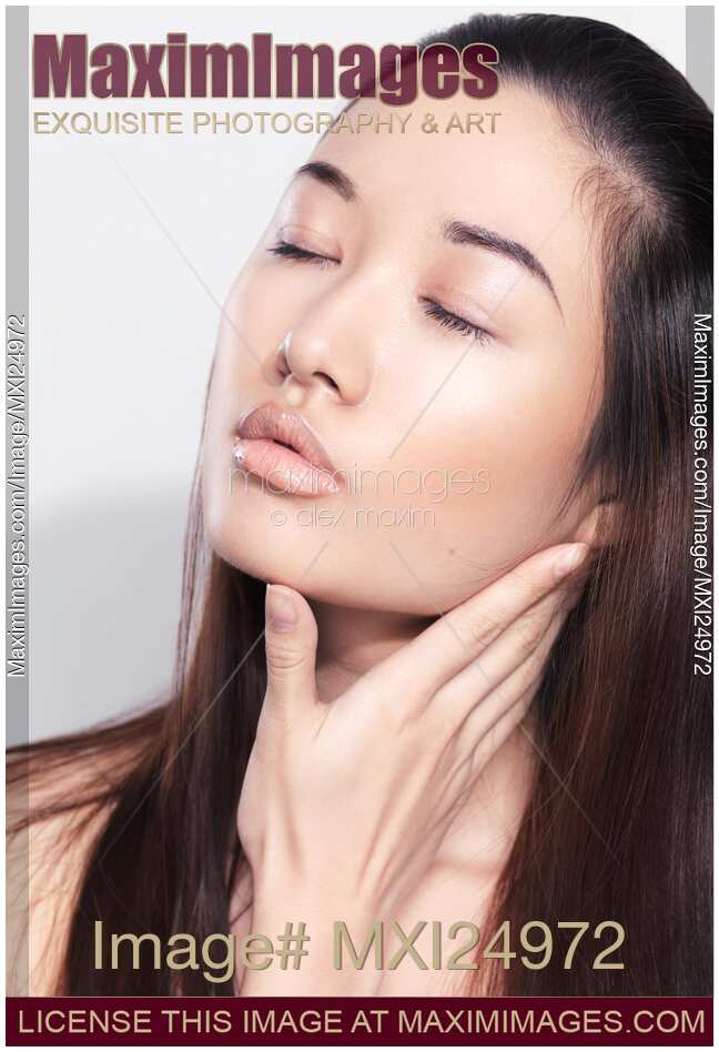 Closeup of a young asian woman face with clean glass skin