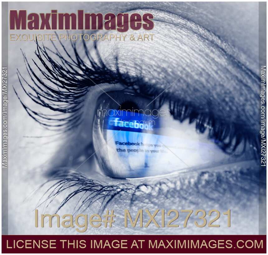Closeup of eye with blue Facebook logo reflecting in it