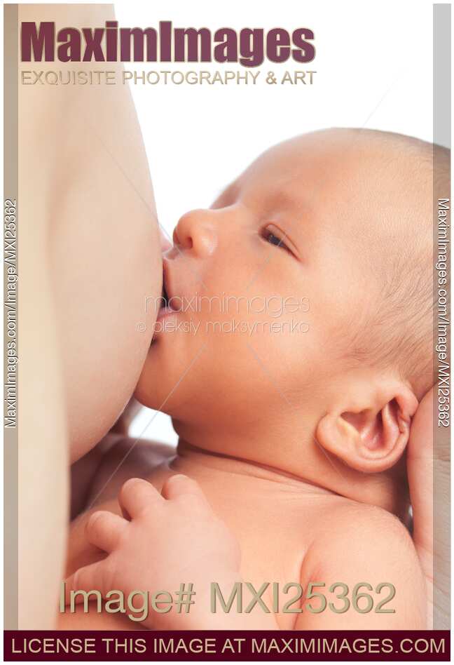 Closeup of Mother Nursing a Newborn Baby