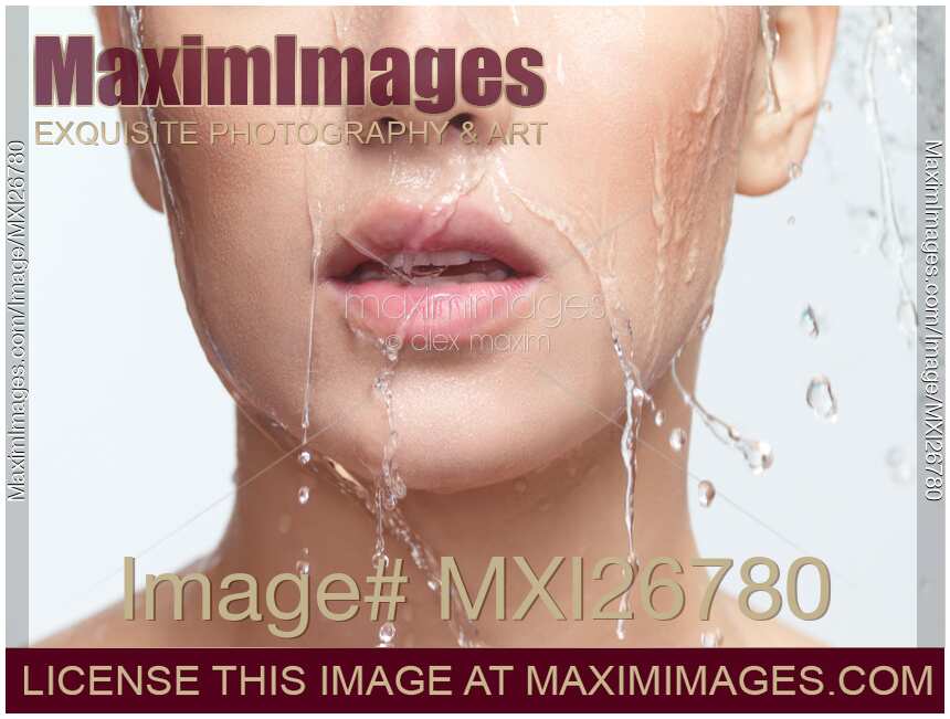 Closeup of woman face with healthy skin, mouth and lips, with water running over it