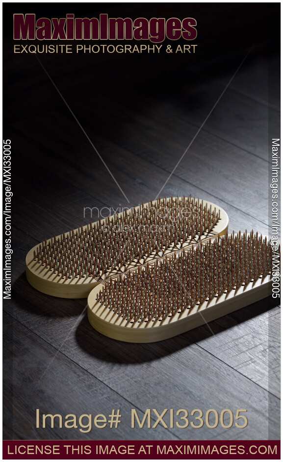 Closeup of Yogic Sadhu Board of sharp metal nails