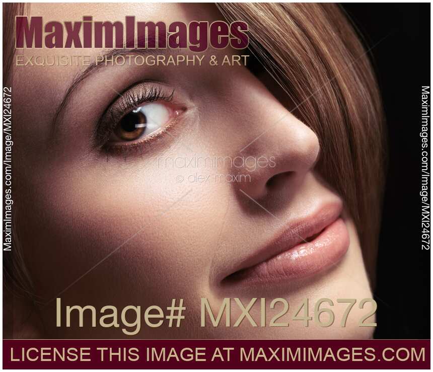 Closeup of young beautiful woman face