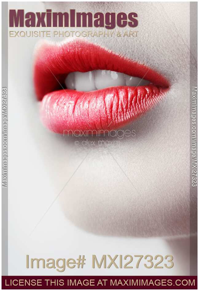 Closeup of young woman red lips