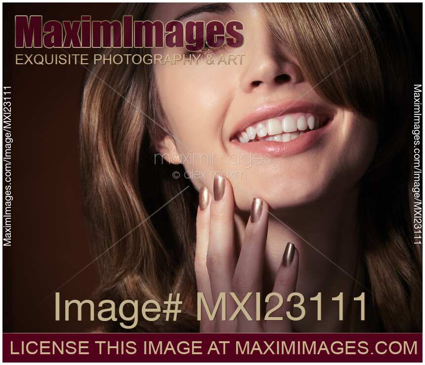 Closeup portrait of a smiling young woman