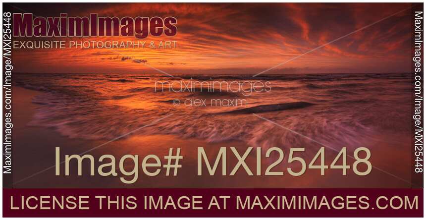 Colorful dramatic sunset over lake Huron panorama