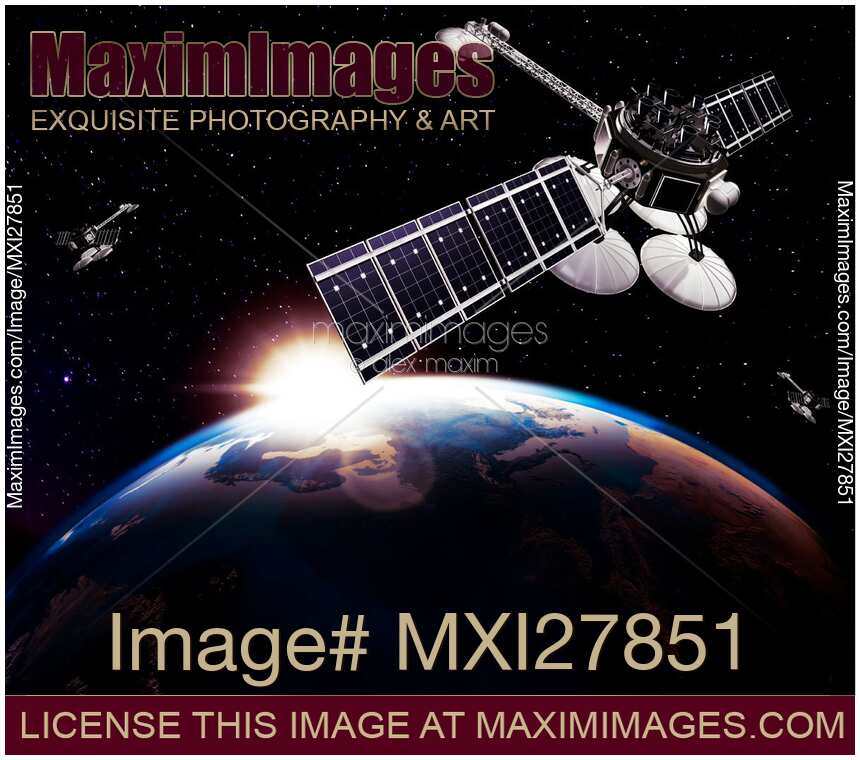 Communication satellites in space above Earth with rising sun