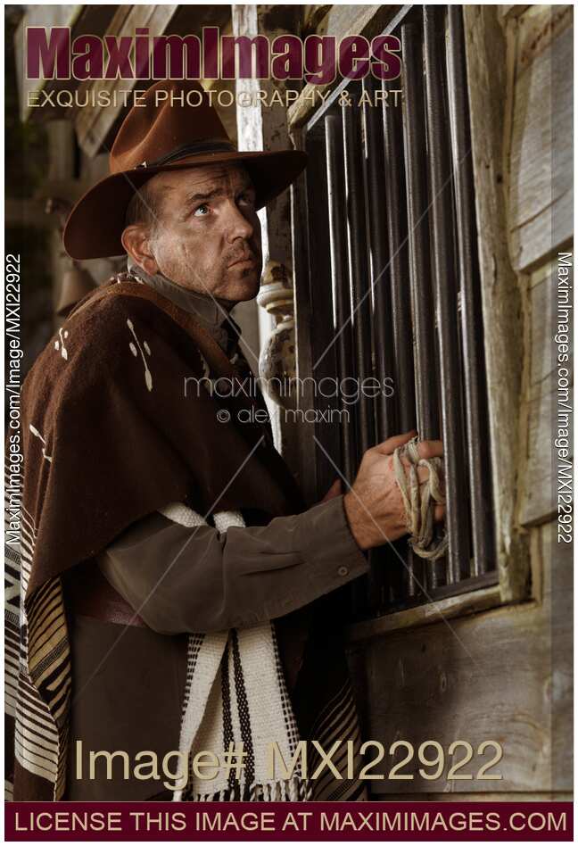 Cowboy Attempting to Rob a Bank Wild west bank robber