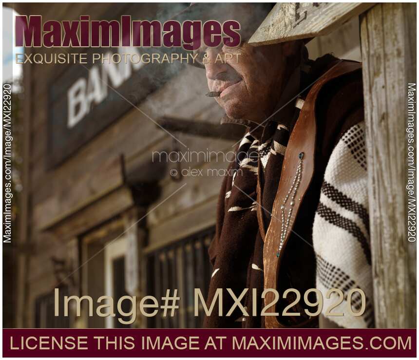 Cowboy Smoking a Cigar Outside of a Bank Building Notorious villain in Wild west style
