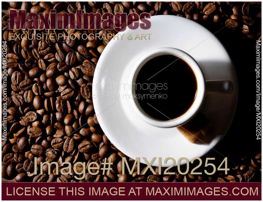 Cup of Black Coffee on Coffee Beans