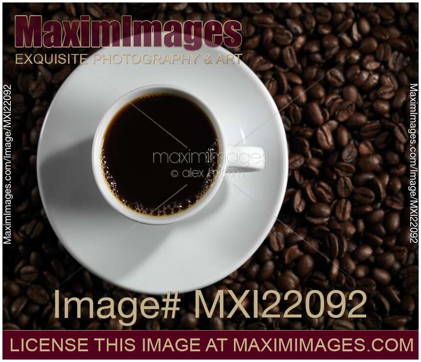 Cup of Coffe on Coffee Beans