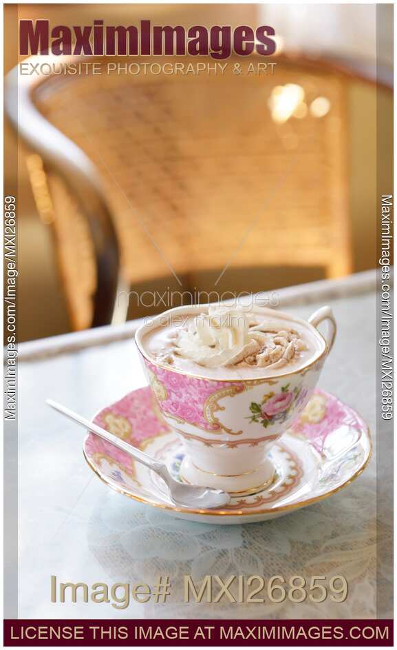 Cup of hot chocolate on table
