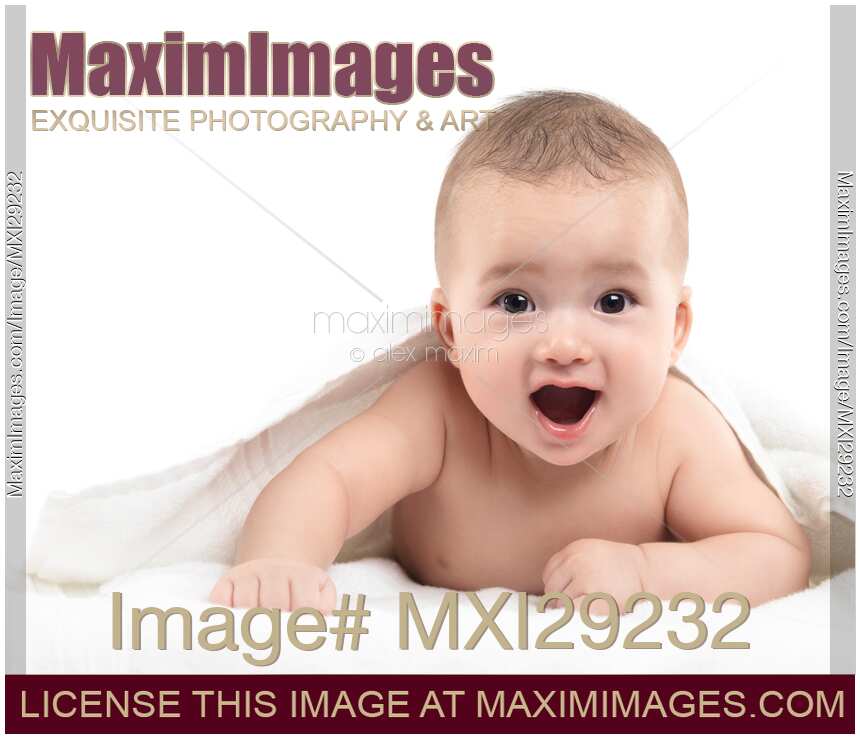 Cute baby boy with surprized excited expression on his face