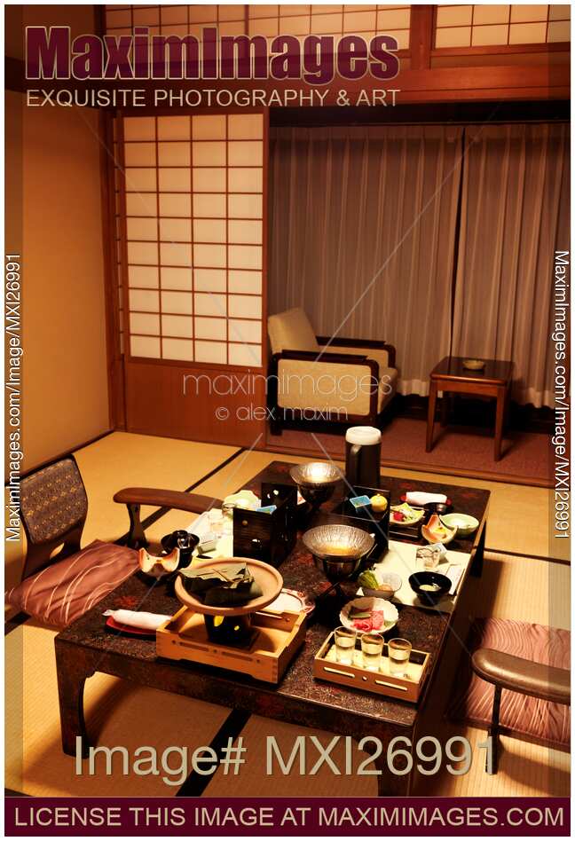 Dinner served on table at Japanese ryokan hotel room