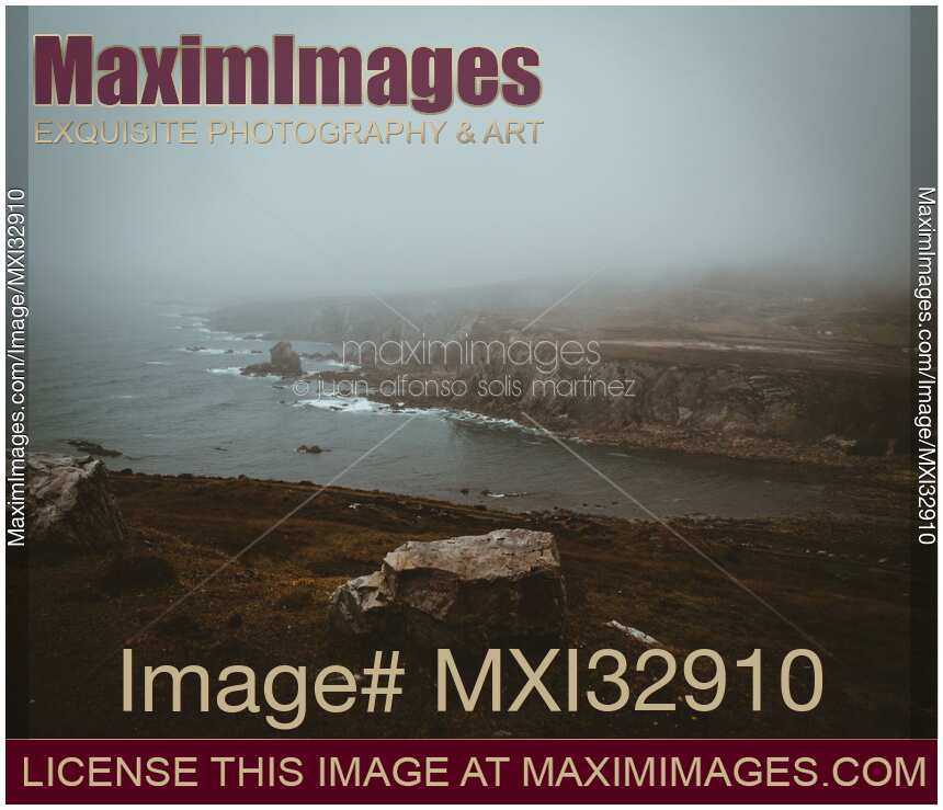Dramatic aerial nature scenery of rocky sea shore in fog Sligo Ireland