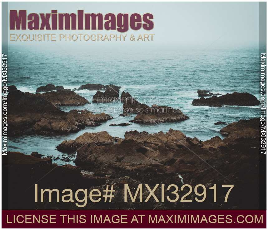 Dramatic landscape scenery of rocky sea shore in Sligo Ireland misty seascape
