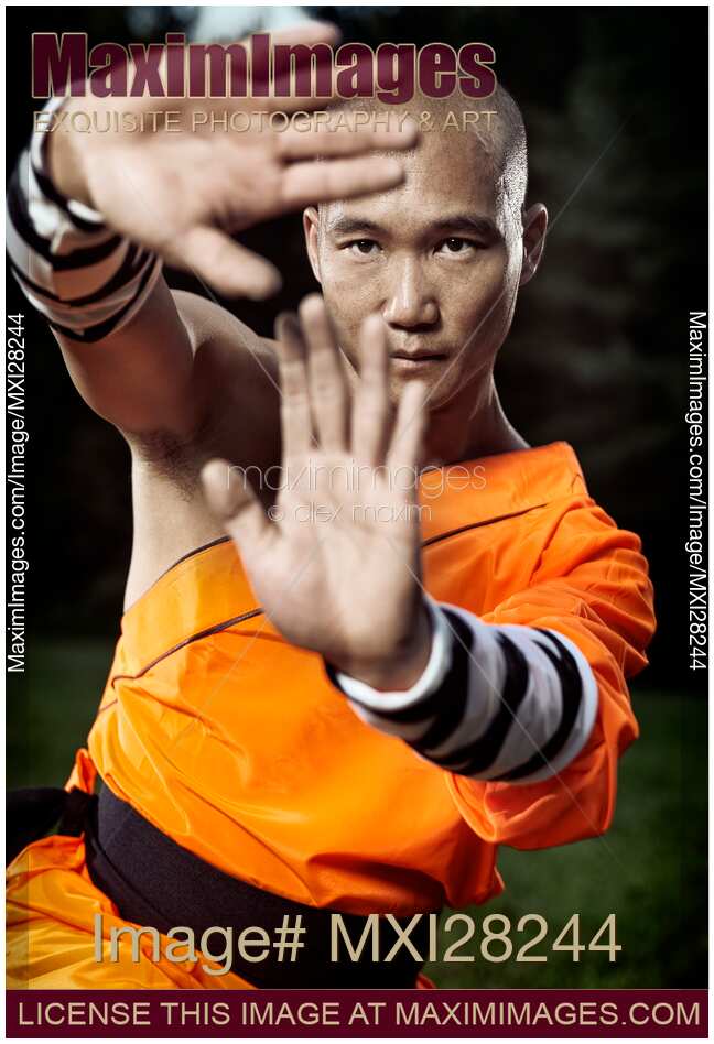 Dramatic portrait of a Shaolin warrior monk practicing Kung Fu