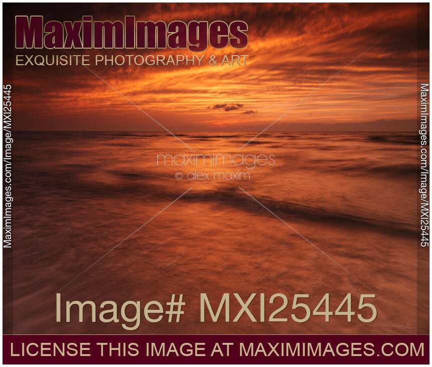 Dramatic red sky over lake Huron sunset scenery
