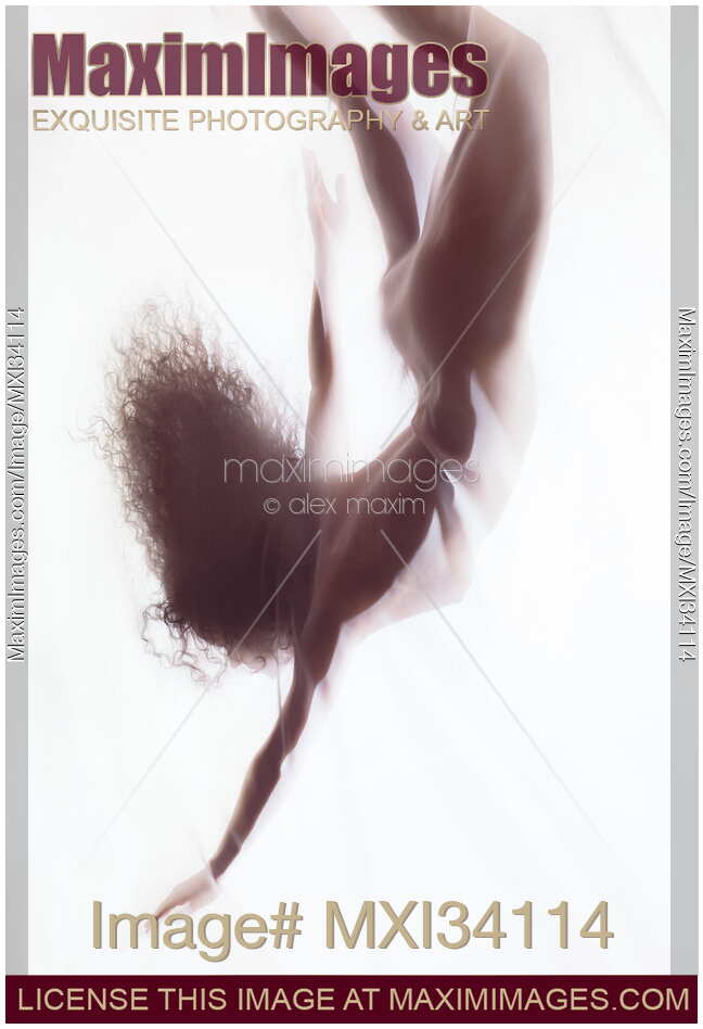Dreamy ethereal silhouette of a nude woman falling gracefully through white glowing mist behind the veil