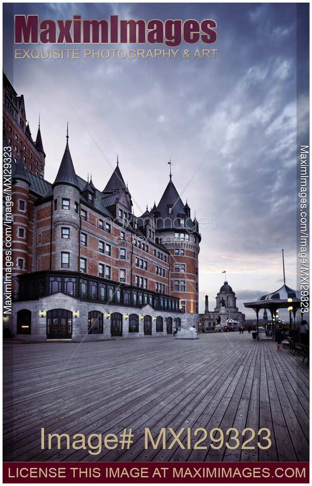 Dufferin terrace at Fairmont Le Chateau Frontenac grand hotel in Quebec city with dramatic skies