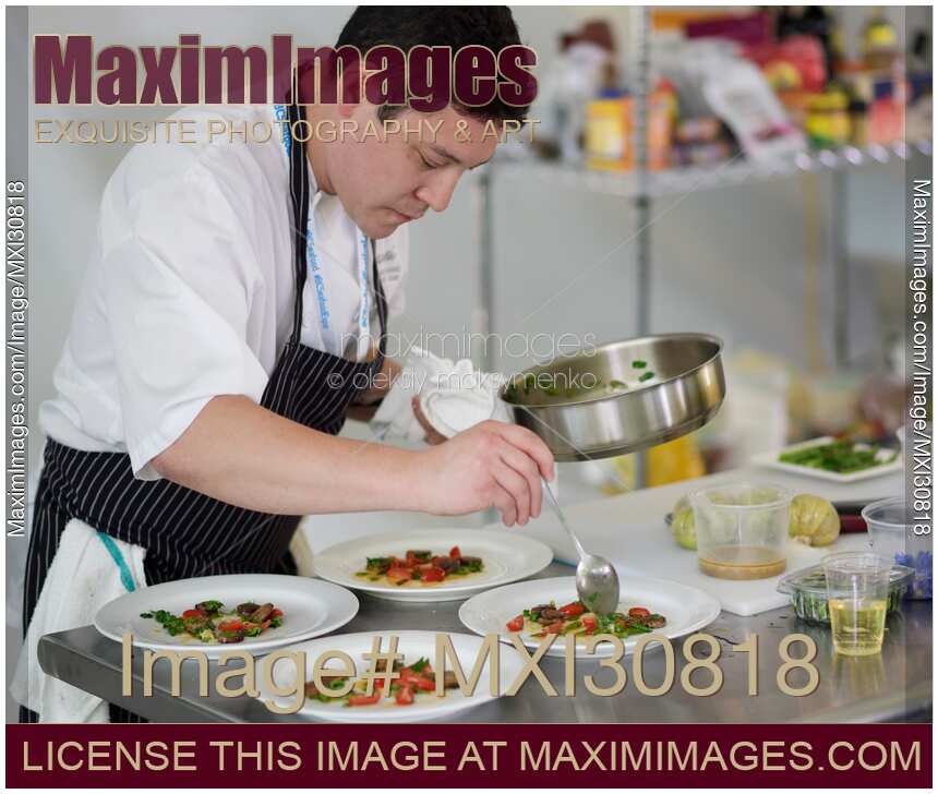 Executive Chef Quang Dang preparing a gourmet competition meal at BC Seafood Festival