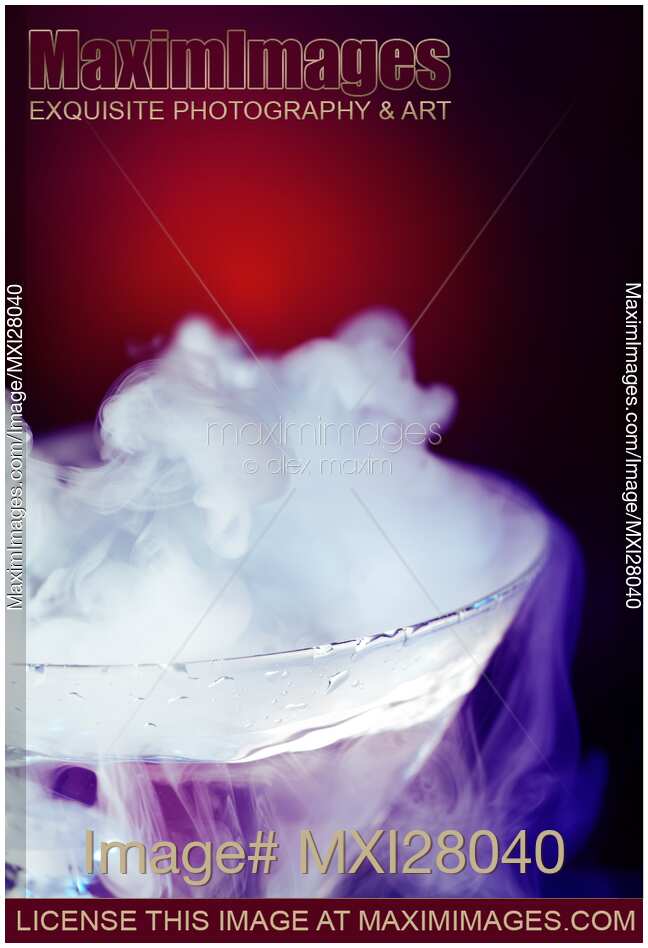Exotic drink chilled with dry ice