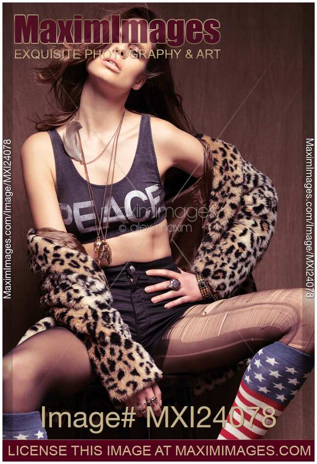 Expressive photo of a young woman dressed in grungy style
