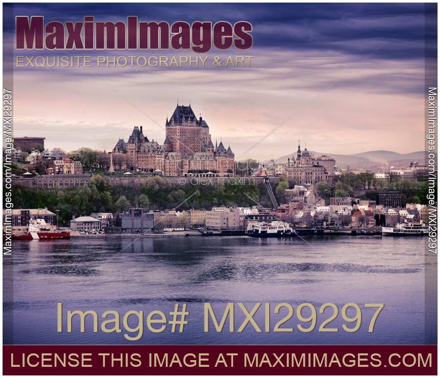 Fairmont Le Chateau Frontenac grand hotel and St. Lawrence river Quebec City skyline at dusk