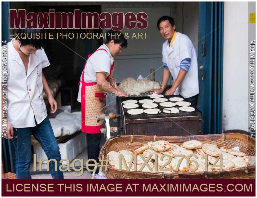 Family business selling bread at market in China