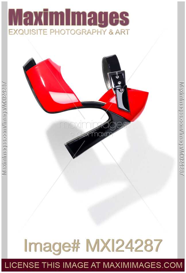 Fancy red high heel womens shoe on white background