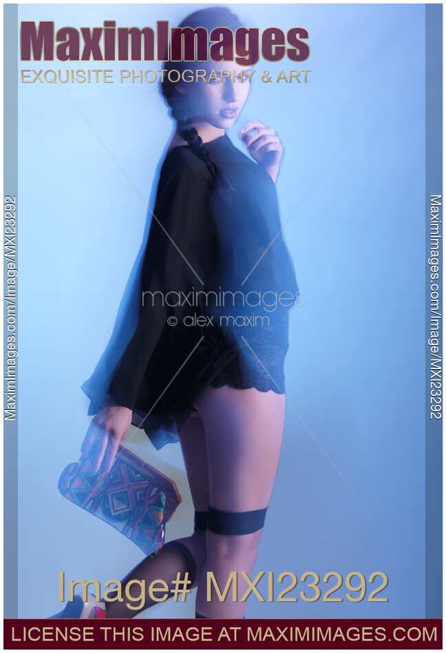 Fashion Photo of a Woman in Shining Blue Settings