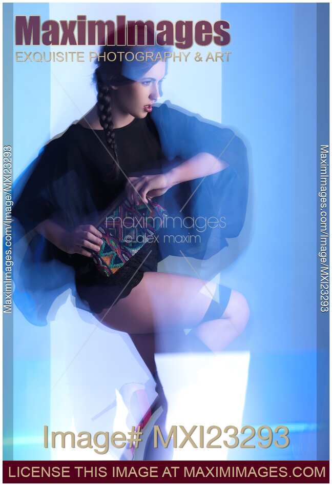 Fashion Photo of a Woman in Shining Blue Settings