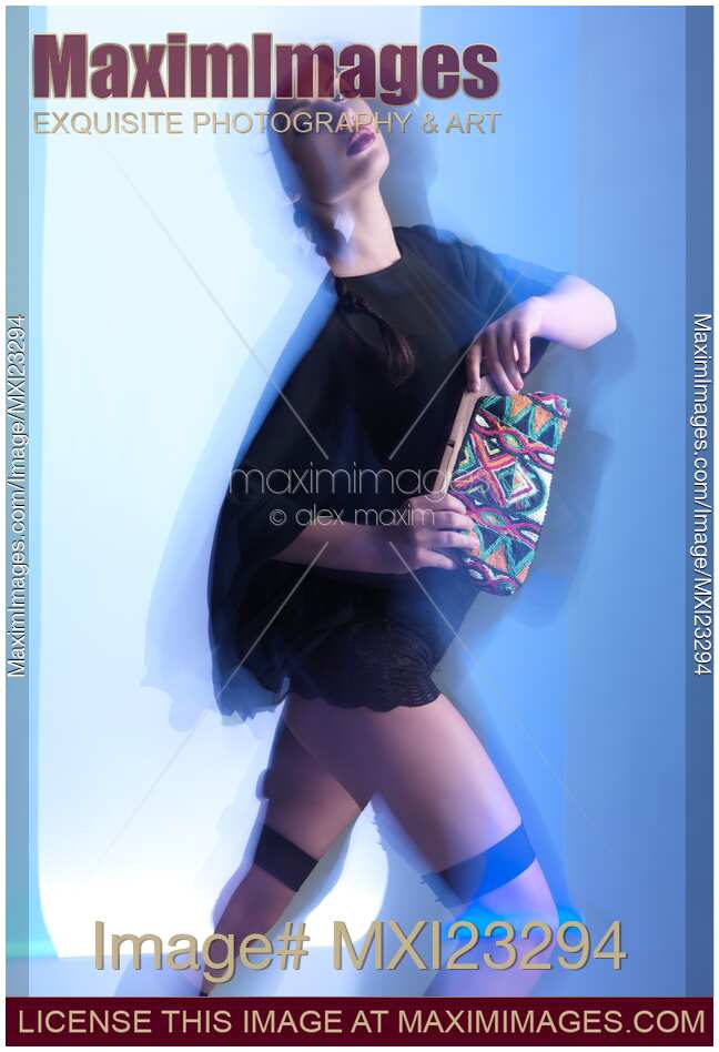 Fashion Photo of a Woman in Shining Blue Settings