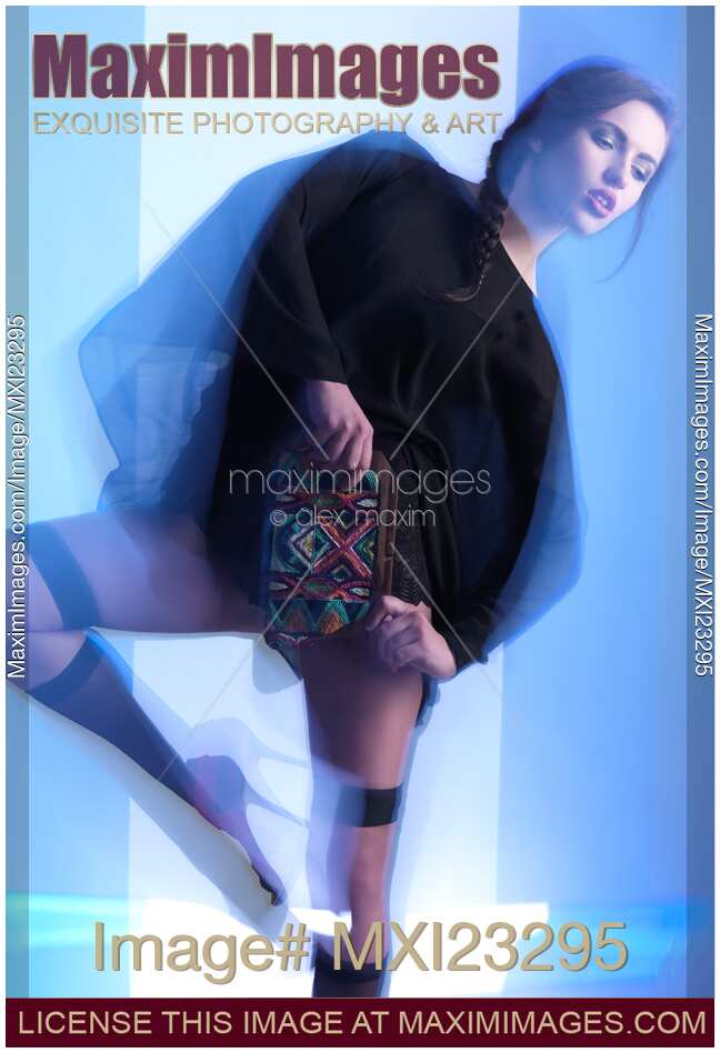Fashion Photo of a Woman in Shining Blue Settings