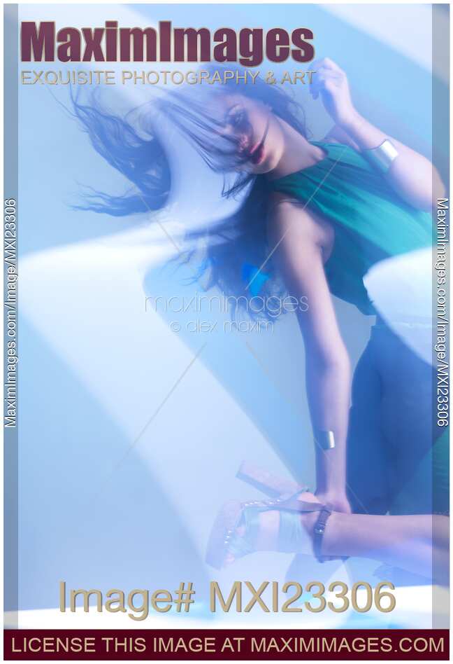Fashion Photo of a Woman in Shining Blue Settings
