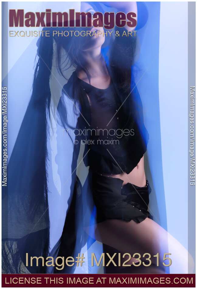 Fashion Photo of a Woman in Shining Blue Settings