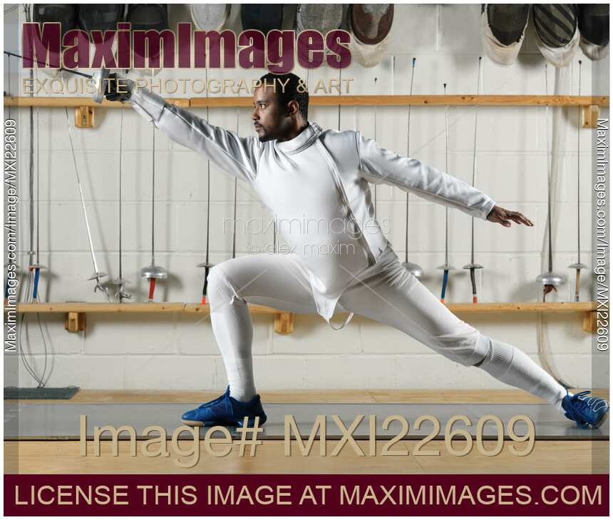 Fencer Practicing in a Gym