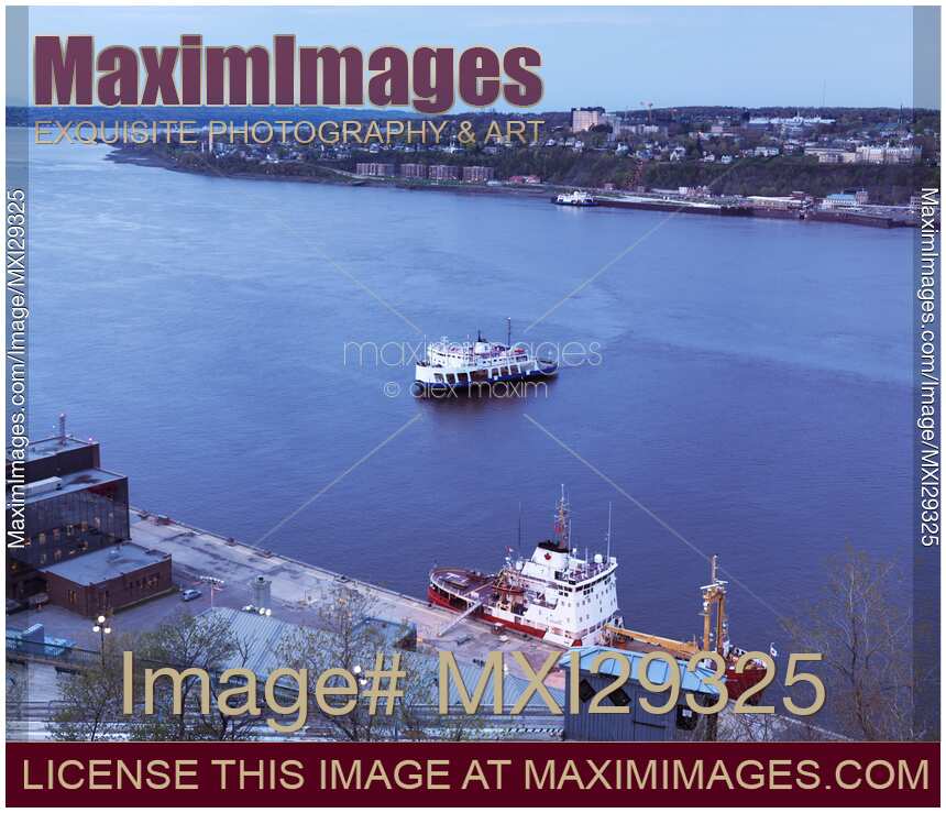Ferry over St Lawrence river in Quebec city Canada at dusk