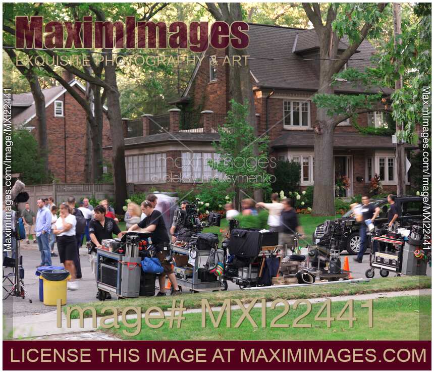 Film Crew Setting up Equipment for a Movie Shoot