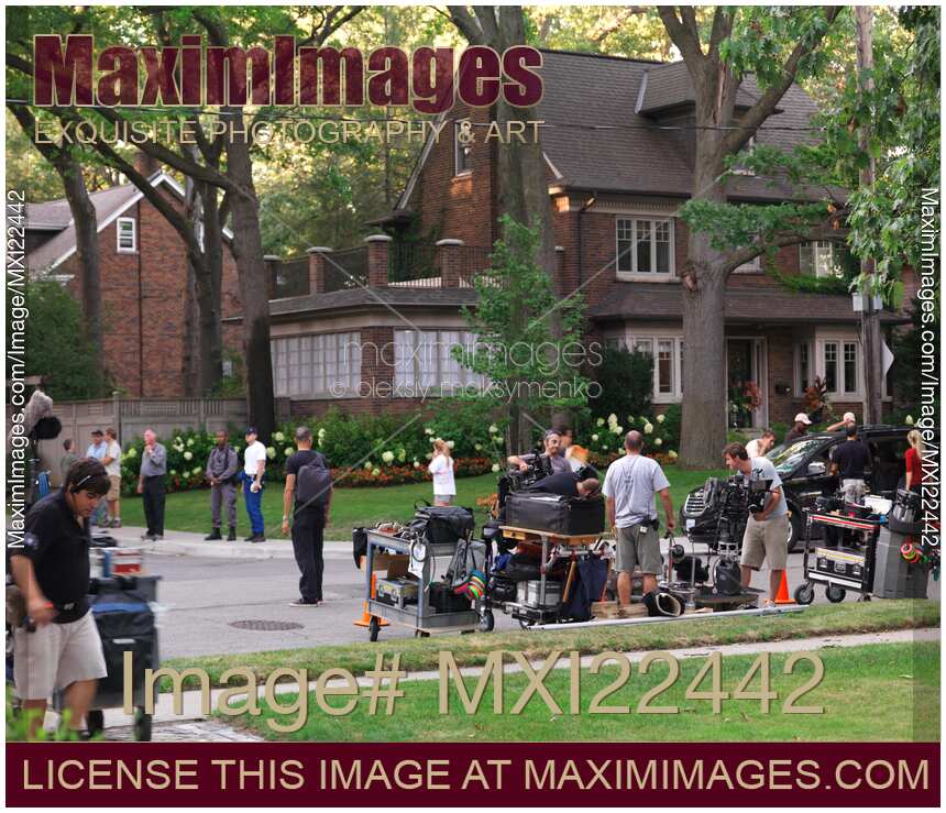 Film Crew Setting up Equipment for a Movie Shoot