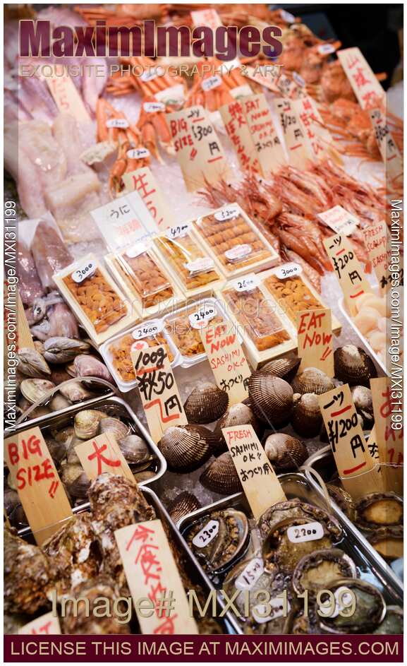 Fresh seafood shrimp oysters scallops shellfish at Nishiki market in Kyoto
