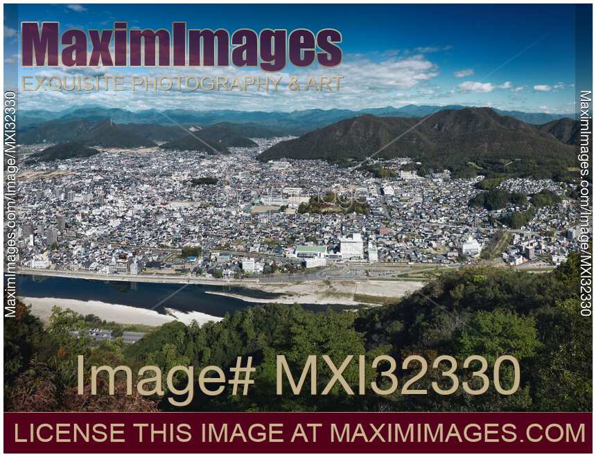 Gifu aerial city scenery on the Nagara River with Mount Dodogamine under blue skies Gifu-shi Japan