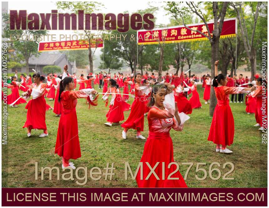 Girls of Tagou Martial arts school in China performing with swords