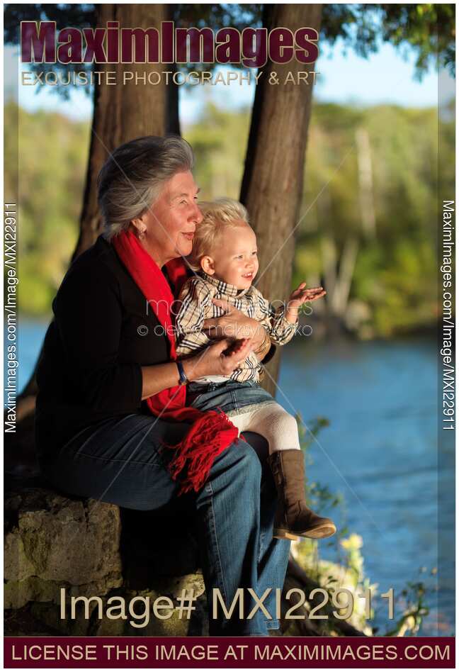 Grandma with Her Granddaughter in the Nature