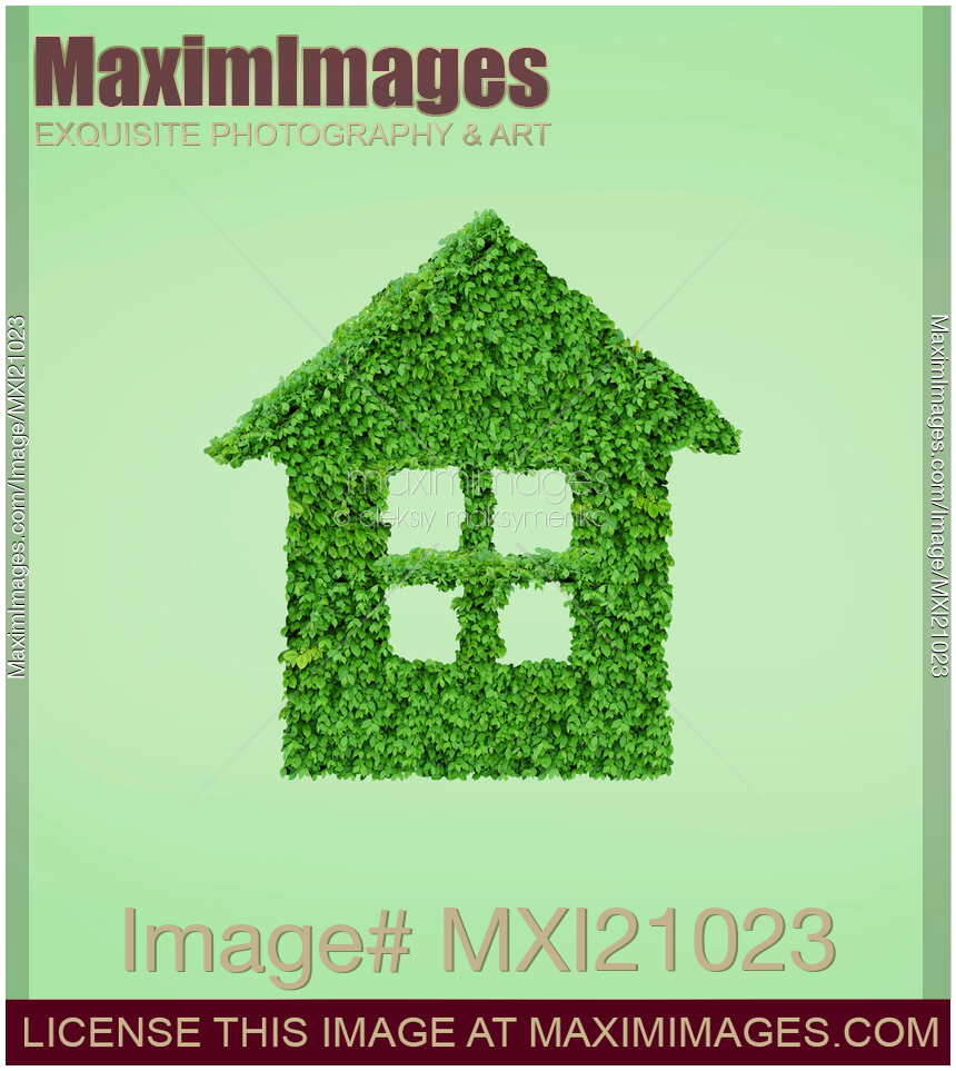Green home conceptual symbol of a house made from green leaves