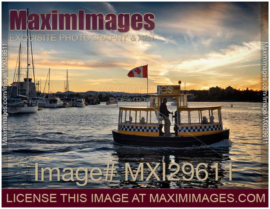 H2O taxi boat in Victoria harbour in a beautiful sunset scenery