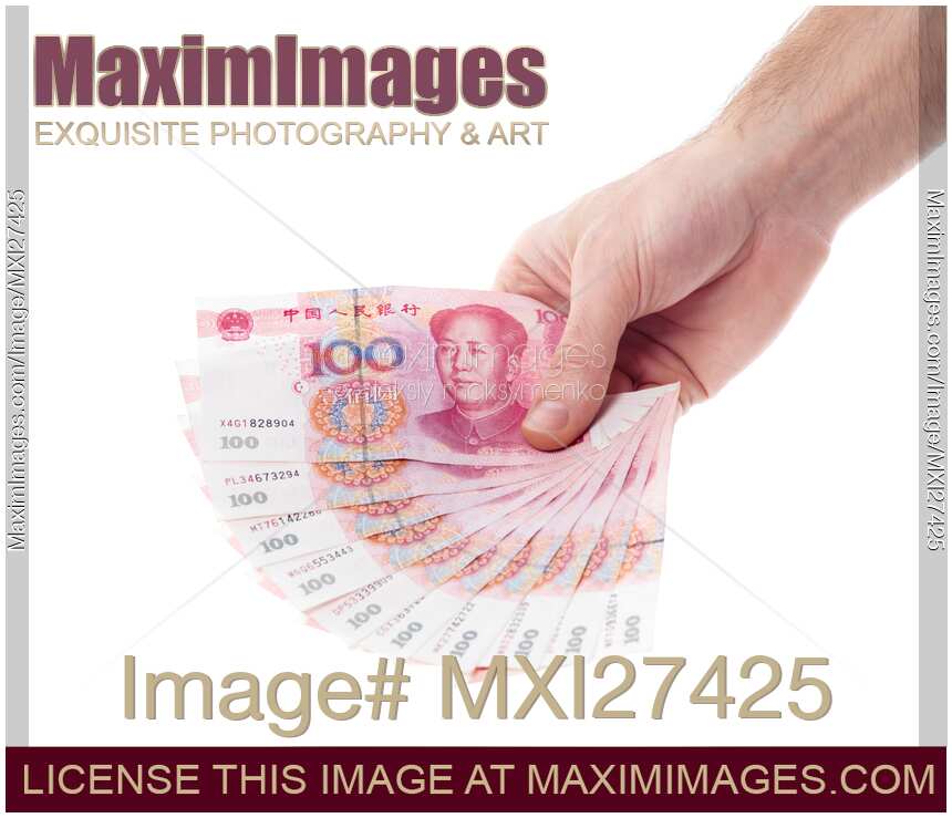 Hand with Chinese Yuan money bills