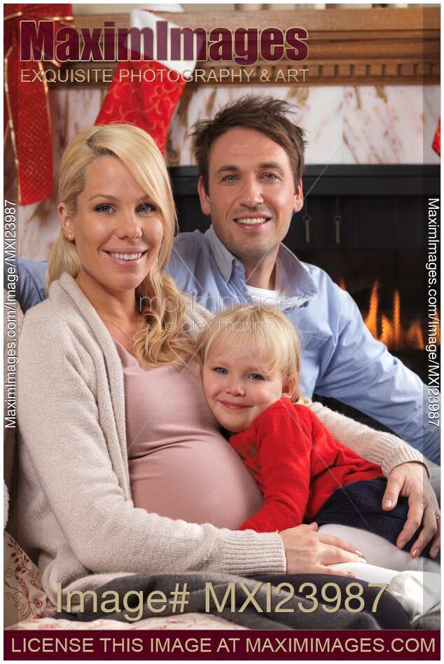 Happy family together at home on Christmas eve