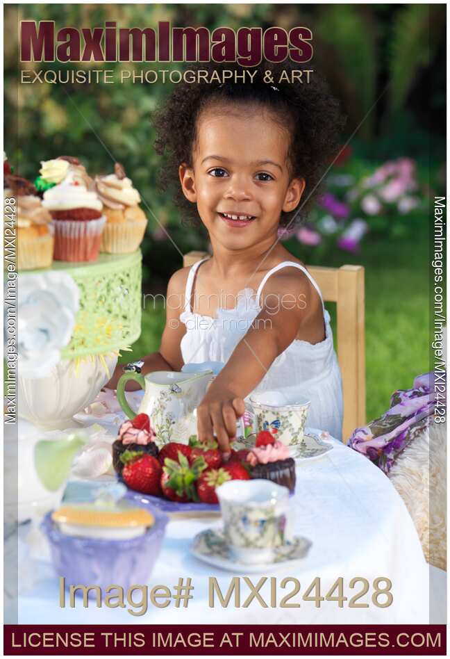 Happy young girl having a party