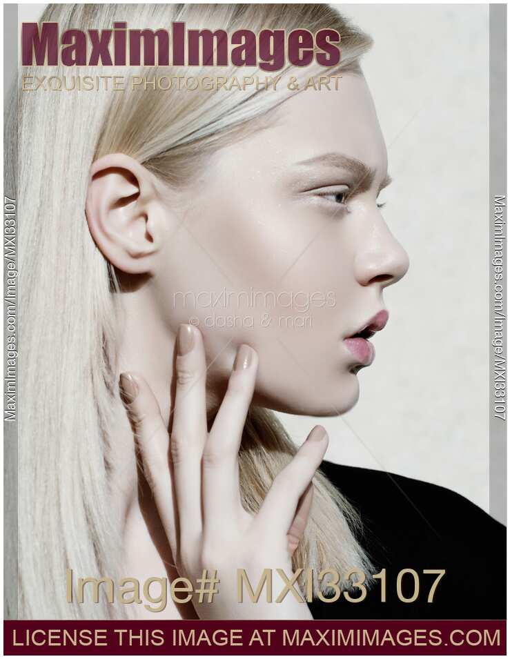 High-end fashion beauty profile of an exquisite blonde woman face with porcelain white makeup
